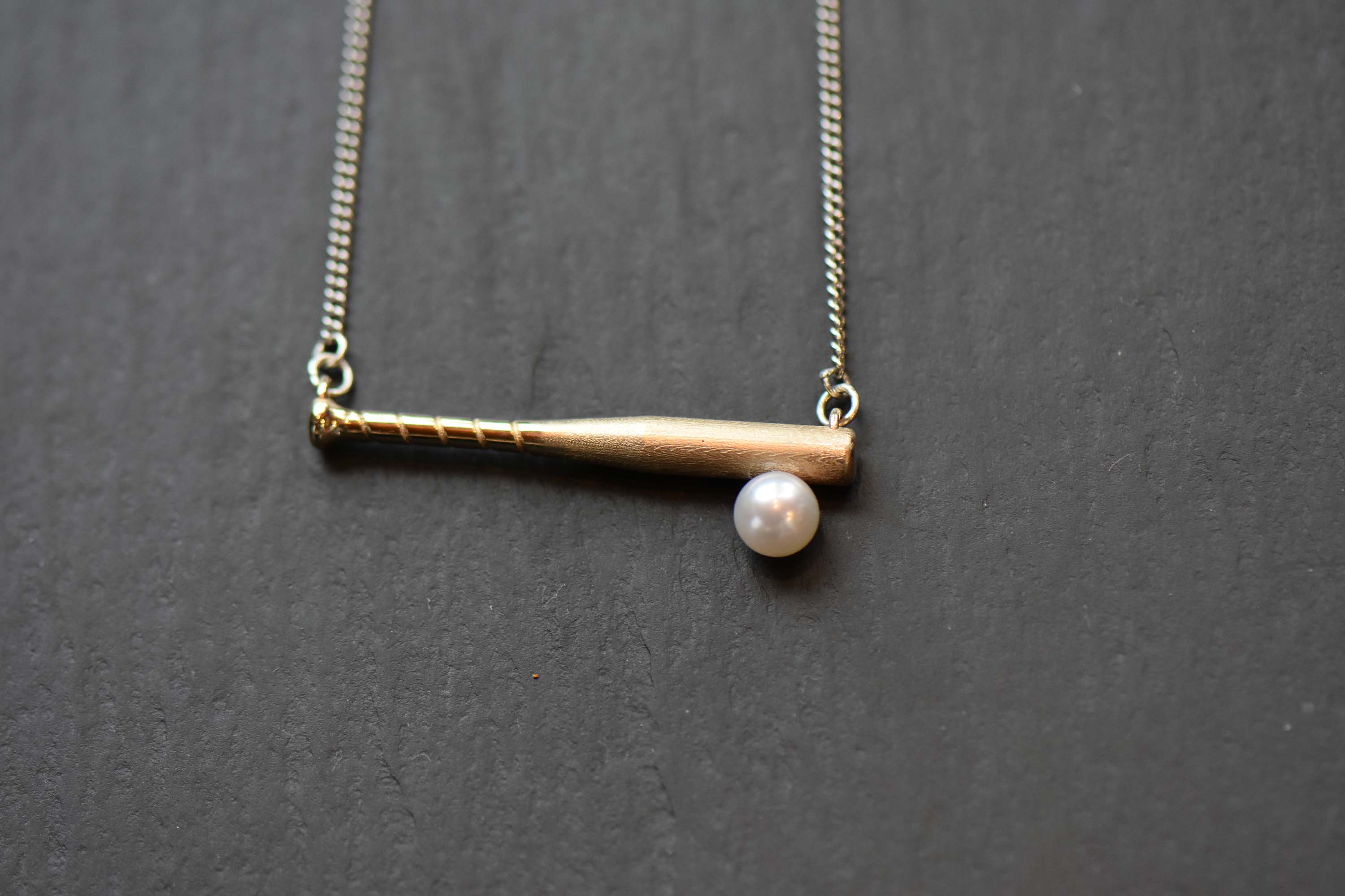 Baseball Bat Pendant in Yellow Gold with an Akoya Pearl